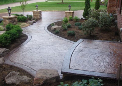 Stamped concrete walkway using high gloss solvent